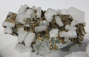 Calcite and Pyrite on Fluorite
